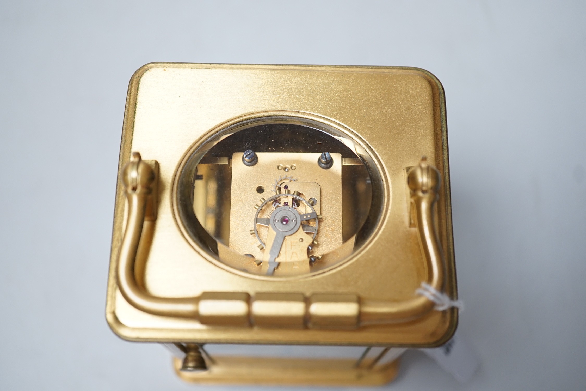 An early 20th century lacquered brass carriage timepiece marked Goldsmiths Alliance, London 17554